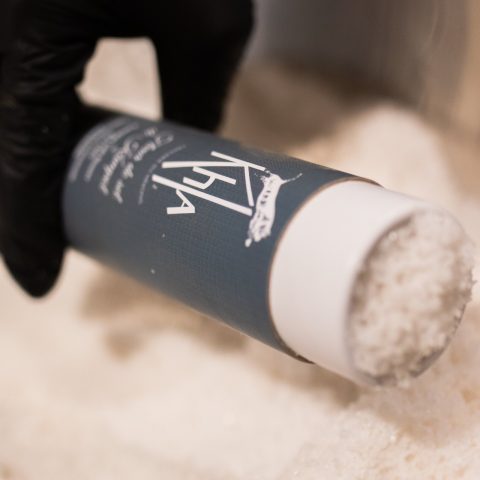 A tube being filled with Kampot salt